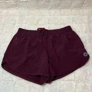 Maroon athletic shorts with built in Spanx and pockets
